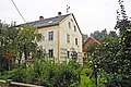 Residential house with built-in workshop (forge and pottery) and outbuildings