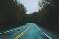 "Rainy_road_(Unsplash).jpg" by User:Fæ