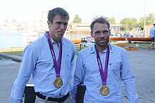 Lightweight double sculls gold medalists Mads Rasmussen and Rasmus Quist Hansen. RasmusQuist MadsRasmussen2012Gold.jpg