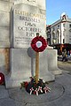 Memorial wreath at the early 20th-century Edith Cavell Memorial. [162]