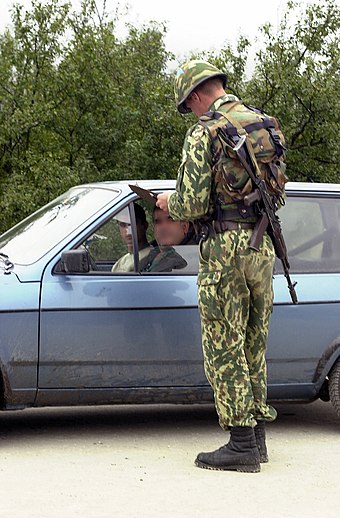 A Russian soldier at a checkpoint in Kosovo in 2001