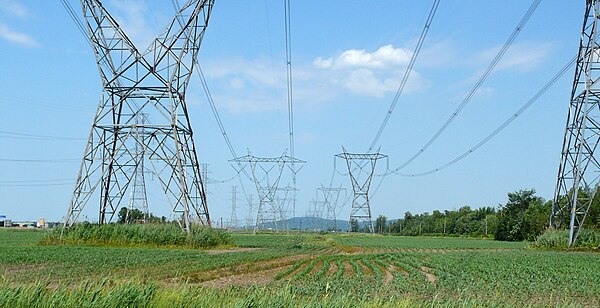 Высокая мощность. Передача электроэнергии. HVDC линия в Китае. Опоры электрические исторические. Индийские электрические опоры.