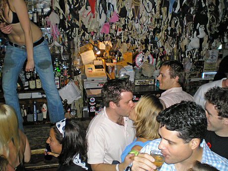 Brassieres hung by patrons at Hogs and Heifers