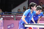 Deutsch: Tischtennis bei den Olympischen Jugendspielen 2018; Tag 9, 15. Oktober 2018; Mixed, Finale, Mixed-Doppel – Miu Hirano & Tomokazu Harimoto (JPN) gegen Sun Yingsha & Wang Chuqin (CHN) 1:3 English: Table tennis at the 2018 Summer Youth Olympics at 15 October 2018 – Mixed Final, Mixed-Double – Miu Hirano & Tomokazu Harimoto (JPN) Vs Sun Yingsha & Wang Chuqin (CHN) 1:3