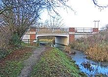 The 2004 Gateway Bridge at South Cerney was built with sufficient clearance for navigation The new Spine Road Bridge and the Thames and Severn Canal - geograph.org.uk - 1082577.jpg