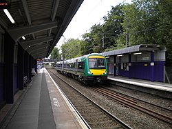 Train speeding through Bournville station (geograph 5480685).jpg