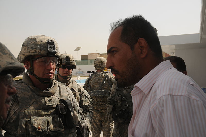 File:U.S. Army Maj. Thompson of Charlie Company, 1st Battalion, 6th Infantry Regiment speaks with an Iraqi contractor in Baghdad, Iraq, Aug. 12, 2008 080812-F-LX971-028.jpg