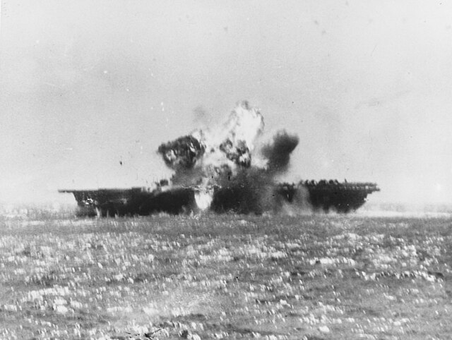 Essex is hit by a kamikaze off the Philippines, 25 November 1944.