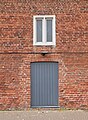 Eastern side of the 17th-century redbrick barn at Hall Place. [545]