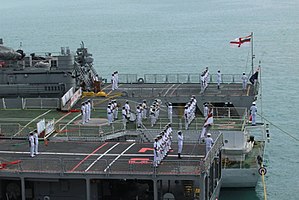 Ships of the 1st Training Squadron 1 TS Ships Presenting Colour Guard at Port Victoria, Seychelles.JPG