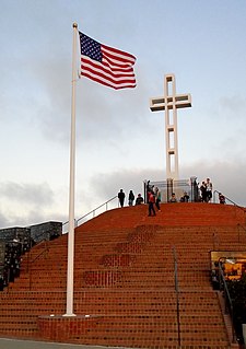 The American flag and the cross in 2019 2019 Mt. Soledad National Veterans Memorial at dusk 4.jpg