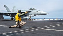An F/A-18E Super Hornet of VFA-211 is launched from Harry S. Truman, March 2022: The pictured aircraft was blown overboard into the Mediterranean Sea in July 2022. 220304-N-ZE328-1183 VFA-211 FA-18E CVN-75.jpg