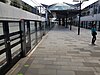 Picture of Bella Vista station. It consists of a platform with platform screen doors within a cutting below ground.