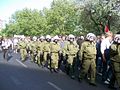 riot police guarding a demonstration against the forced sale of the Køpi, a cultural center and living project and former squat