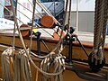 Starboard fore mast yard brace pulley blocks and brackets beside main mast shroud