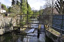 Former hydroelectric dam at the exit of Bèze (Belle-Isle farm in Bèze, towards Mirebeau-sur-Bèze).[41]