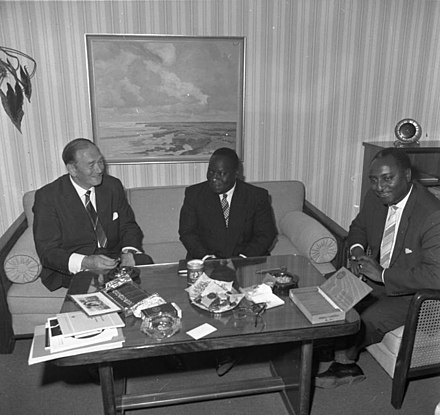 West German vice minister of workfare, Wilhelm Claussen (left), with Paul Armegee, transport minister of Togo, in Bonn, 1961