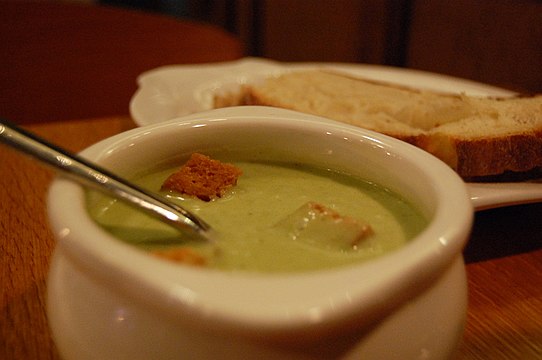 A lettuce soup with croutons