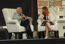 Kellogg interviewing Buzz Aldrin in 2016 Buzz Aldrin being interviewed at the 2016 L.A. Times Festival of Books by Carolyn Kellogg (cropped).png