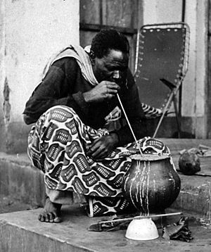 Drinking traditionally brewed pombe in 1967