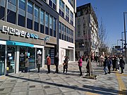 Line outside a pharmacy in Sejong City awaiting the store to open so they can buy masks