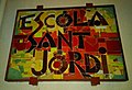 Cartell de l'Escola Sant Jordi a Vilassar de Dalt.