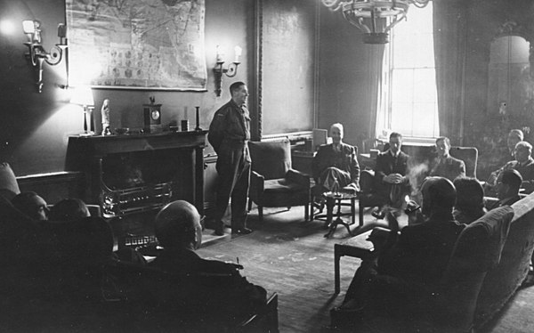 Committee of Post-War Reconstruction meeting in the institute's Common Room, 1943.