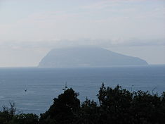 The island of Corvo as seen through the mists across the channel on Flores