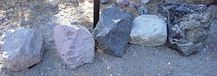 Grey, red, black, altered white/tan, flow-banded pumice dacite Different types of dacite-1200px.JPG