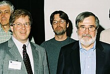 Ken McMillan (middle) with David L. Dill (lower left), Robert P. Kurshan (upper left), and Edmund Clarke (right) at FLoC 2006. Edmund Clarke 2 FLoC 2006.jpg