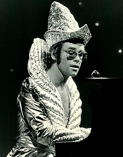 Elton John topped the chart for the first time with "Daniel". He would go on to be one of the most successful acts in the chart's history. Elton john cher show 1975.JPG