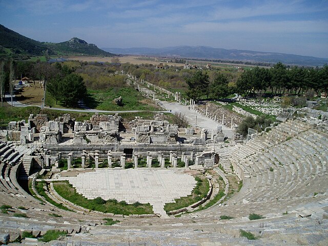 Close up of Ephesos ancient Greek amphitheatre with a maquis shrubland