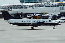 A Great Lakes EMB 120 at Denver International Airport Great Lakes - EMB 120.jpg