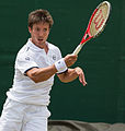 Igor Sijsling competing in the third round of the 2015 Wimbledon Qualifying Tournament at the Bank of England Sports Grounds in Roehampton, England. The winners of three rounds of competition qualify for the main draw of Wimbledon the following week.