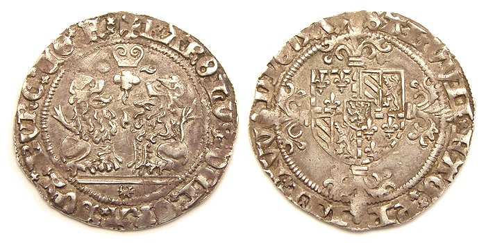 Dubbel vuurijzer, geslagen onder Karel de Stoute, hertog van Bourgondië. Voorzijde: Twee zittende leeuwen onder een vonkend vuurijzer. Keerzijde: Bloemenkruis met het wapen van Bourgondië.