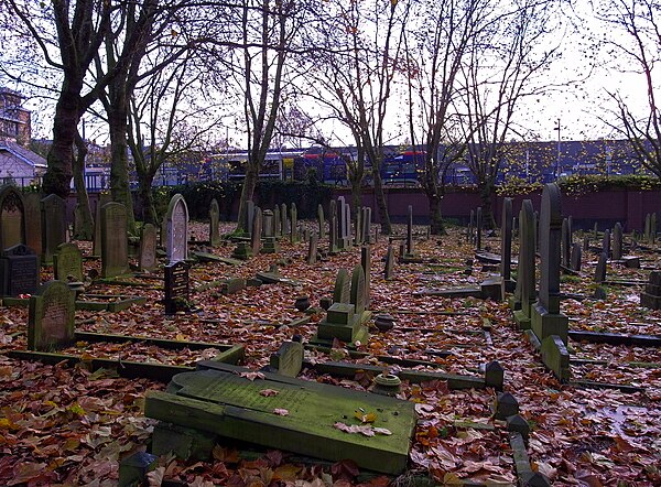 Key Hill Cemetery in the Autumn, Jewellery Quarter station is behind the wall