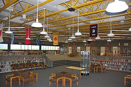 The original library in the 1971 addition. The space is now occupied by the fitness room, back gym, and health classes. LHSmediaCenter09-1971.jpg