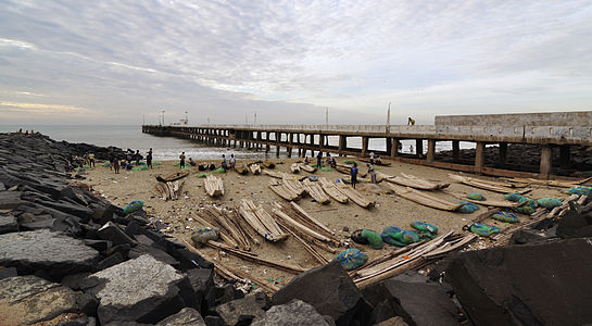 Long pier in Pondicherry and early morning activities of fishermen