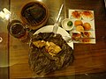 Machang (Zongzi or Ma-Chang 肉粽 - a variant of Lo mai gai shaped in a triangular pattern - Chinese food made from sticky rice with chicken or pork adobo inside seasoned with bean sauce. It has also some mushrooms)