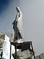 Mont Dolent summit statue, bearing inscription.