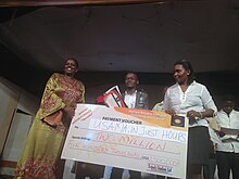 Usama receiving his winning price Movie Furnace.JPG