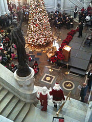 Mr. and Mrs. Santa Claus make their entrance at the Library of Congress Great Hall, December 2010.jpg