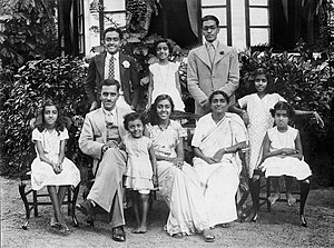 A Saint Thomas Syrian Christian family from Thiruvalla (1937) Mr & Mrs C.P.Matthen with their children.jpg