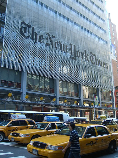 The New York Times Building in Midtown Manhattan; some meanings of the term originated in reference to The New York Times.
