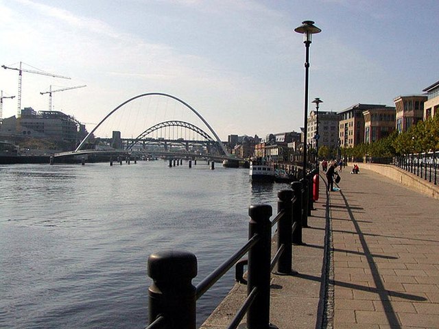 The Gateshead Millennium Bridge for pedestrians and cyclists and the Tyne Bridge for vehicles in the background in Newcastle upon Tyne