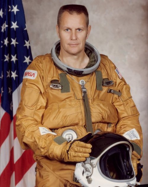 Overmyer in his spacesuit in 1982