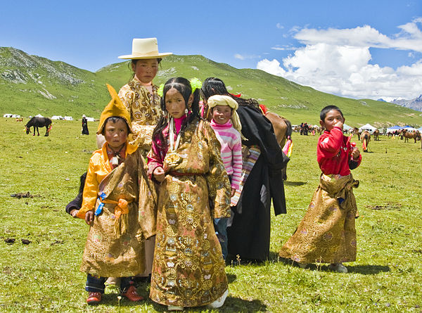 Tibetan family in Kham attending a horse festival