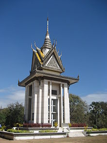 Choeung Ek Monument contains more than 5,000 human skulls. Phnom Penh, Killing Fields of Choeung Ek (6226142426).jpg