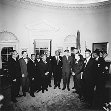Civil rights, labor leaders, and politicians celebrate after the March. Photograph of Meeting with Leaders of the March on Washington August 28, 1963 - NARA - 194276.jpg