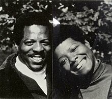 Angelou with Tom Feelings, who illustrated Now Sheba Sings the Song (1987). Portrait photograph of Tom Feelings and Maya Angelou by Ted Pontiflet from the 1987 first-edition dust jacket of Now Sheba Sings the Song.jpg